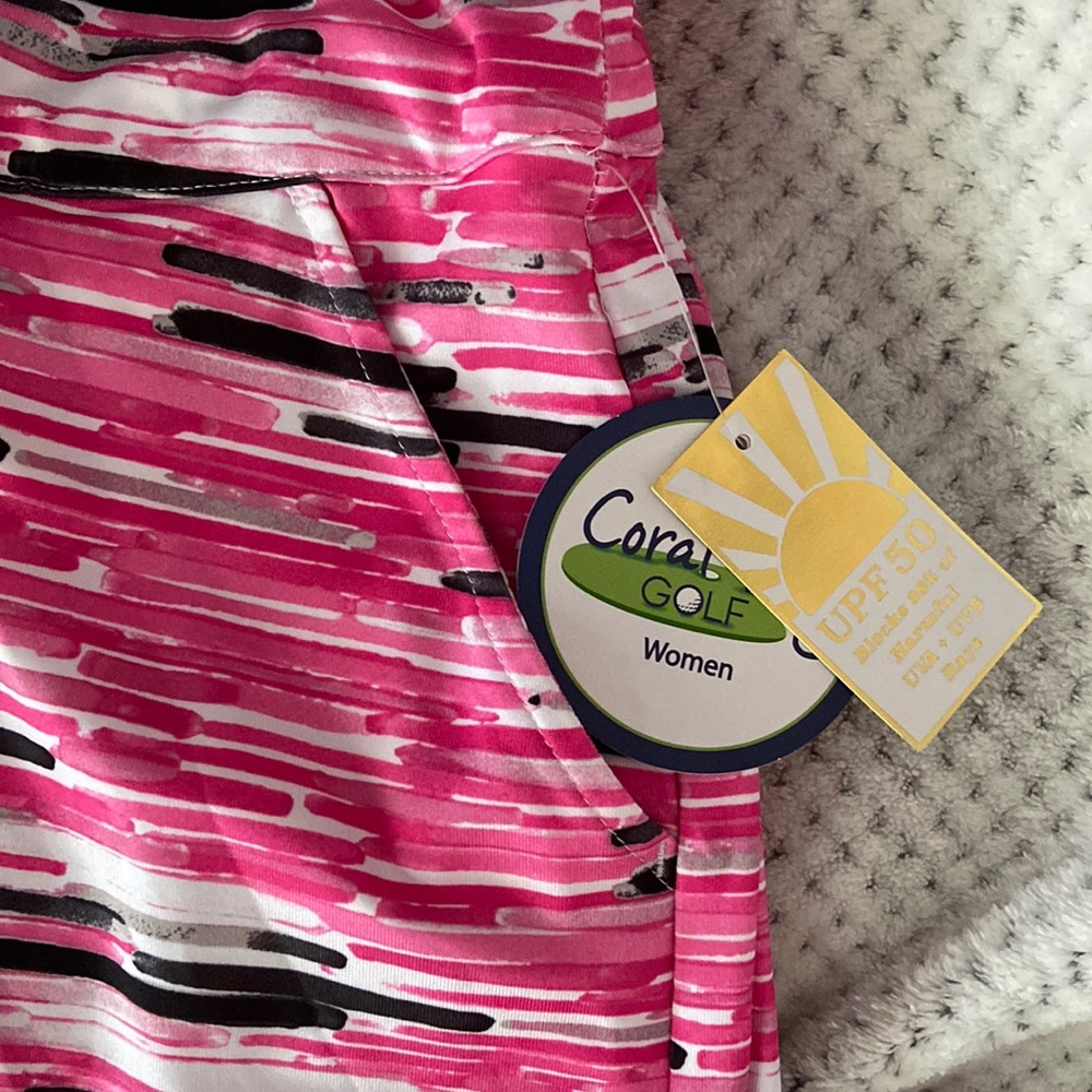 New with tags Golf Skort, swim skirt. Pink white and black. Size 3XL Coral Bay